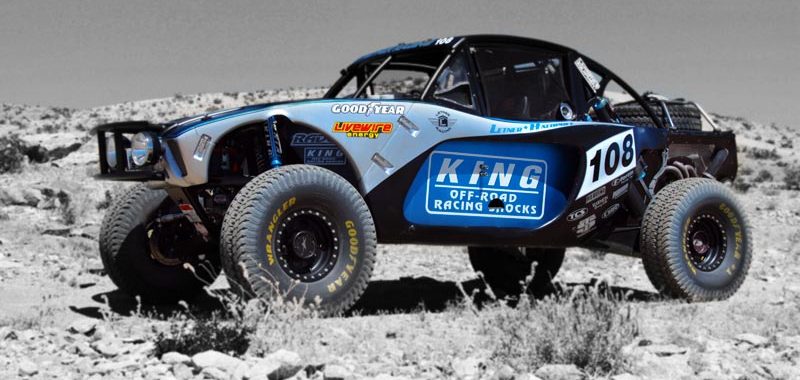 King Shocks is a manufacturer and servicer of custom made adjustable and rebuildable automotive shock absorbers and performance racing products for UTV, OEM replacement and professional racing use. Our company prides itself on putting quality, performance and customer service above all else. Every shock we sell is the result of constant testing and development done with top racers in competition worldwide. This real world testing exposes our designs to a level of abuse and destructive forces that cannot be duplicated in a laboratory or on a computer spreadsheet. Our hands on experience enables us to make rapid design advancements others shock companies havent even dreamed up yet. All parts used in our shocks are machined in house at our Garden Grove, California facility from billet alloy materials on precision equipment to exacting standards and hand assembled by our technicians. In addition to the quality and innovative design features you will find on all King shocks, we provide you with the highest level of customer support. We offer complete tuning and rebuilding services. Our depth of knowledge when it comes to shock tuning and suspension set-up is second to none. We are available on a weekly basis at races, off-road events and tuning sessions helping you attain the most effective damping performance from your suspension. King Shocks also offers design, manufacturing and engineering services for custom one-off applications. If you can dream it, we can build it. When you choose to ride on Kings you can rest assured you will have the finest shocks obtainable.